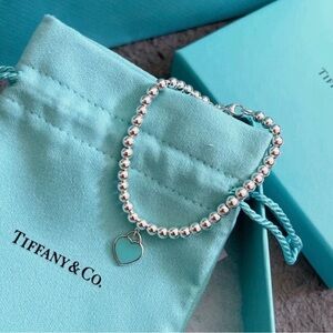 Tiffany & Co. Silver Bead Bracelet with Blue Heart Charm